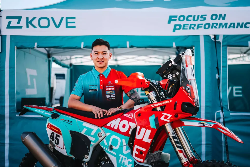 KOVE Rally rider with KOVE 450 Rally EX motorcycle at Dakar